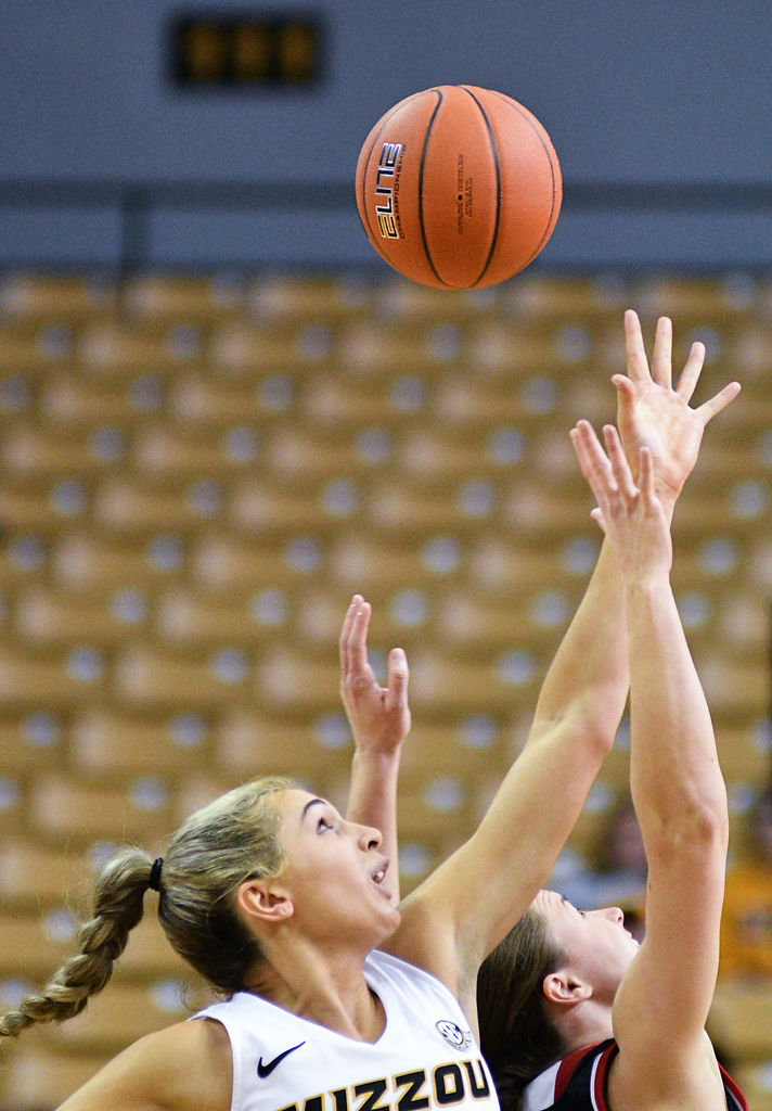 Missouri forward Hannah Schuchts challenges
